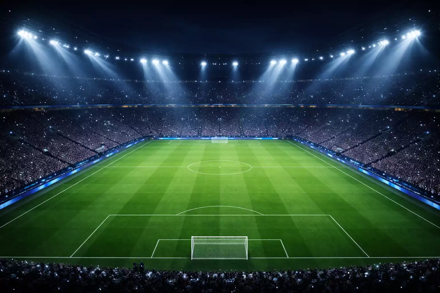 Stadio europeo illuminato di notte durante una partita di Champions League